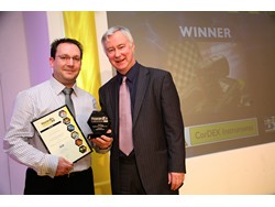 Marcus Halliday (left) of CorDEX winner of Technical Innovation category receives trophy from Neil Powell of BSI Group who sponsored the award
