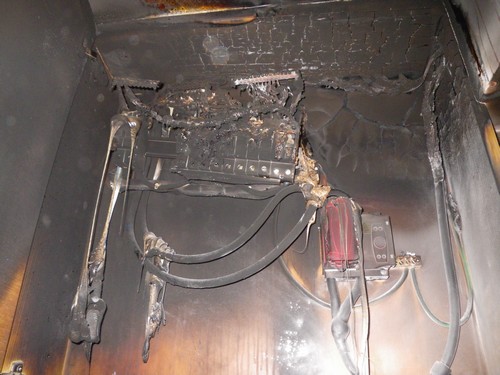 Figure 2: Typical fire damage to the enclosure of a plastic consumer unit in a fire confined to the under stairs cupboard of a two storey house